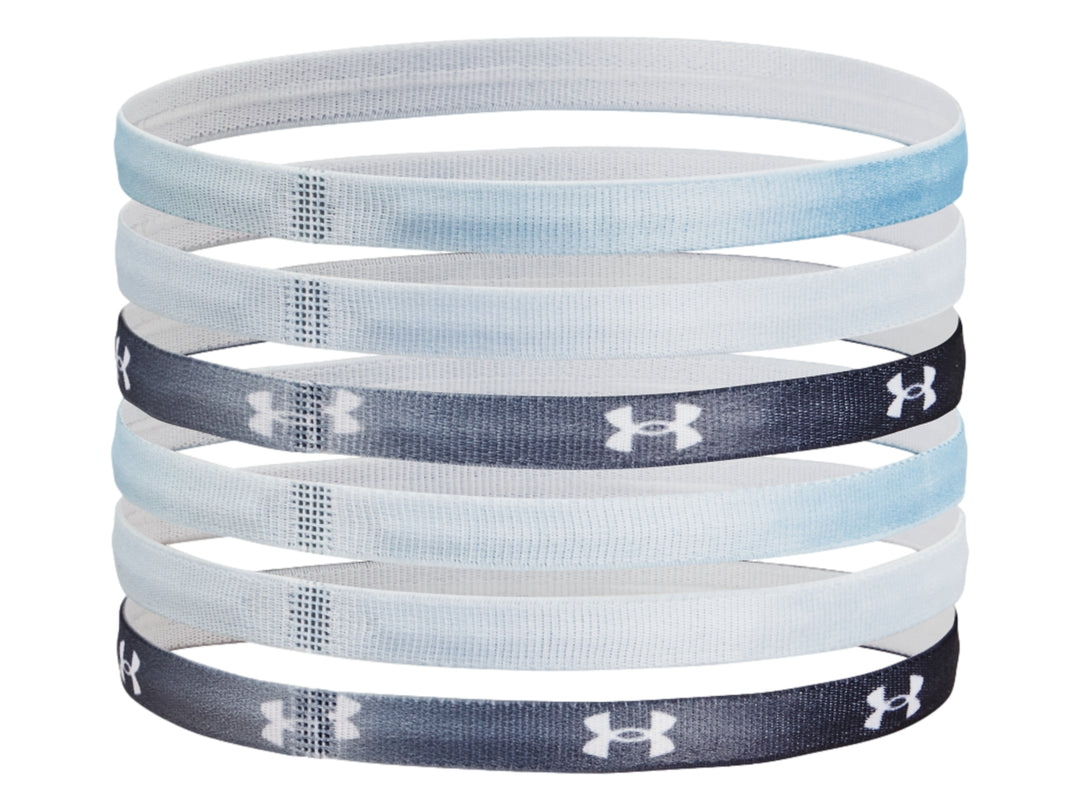 Set de 6 bandas deportivas Under Armour en colores azul, negro y blanco con logotipos y letras.