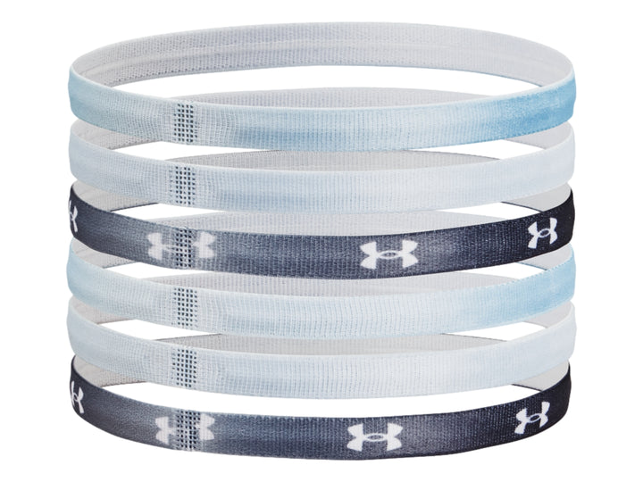 Set de 6 bandas deportivas Under Armour en colores azul, negro y blanco con logotipos y letras.