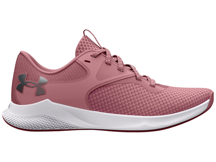 Zapatilla deportiva Under Armour Charged Aurora 2 en color rosa con suela blanca.