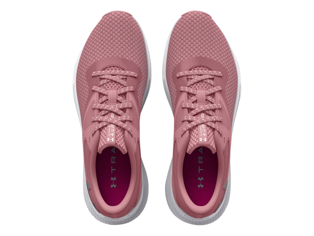 Zapatilla deportiva Under Armour Charged Aurora 2 en color rosa con suela blanca.