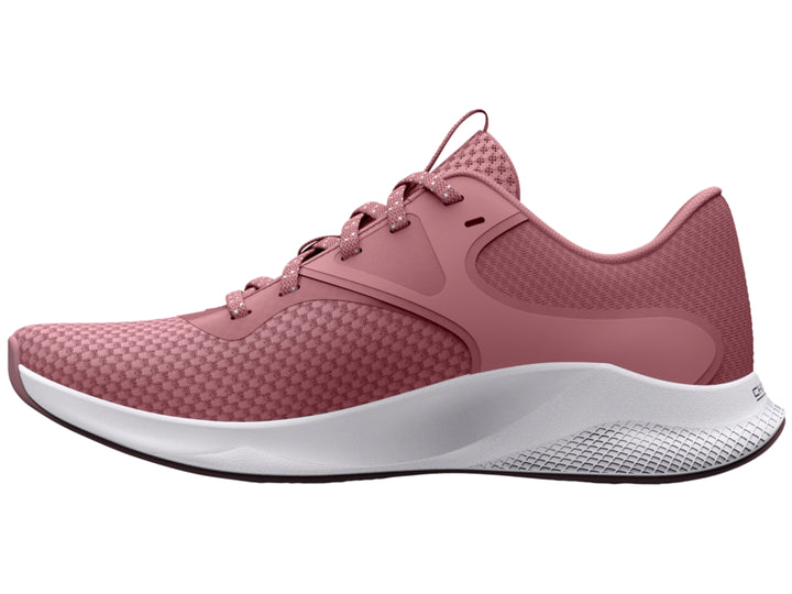 Zapatilla deportiva Under Armour Charged Aurora 2 en color rosa con suela blanca.