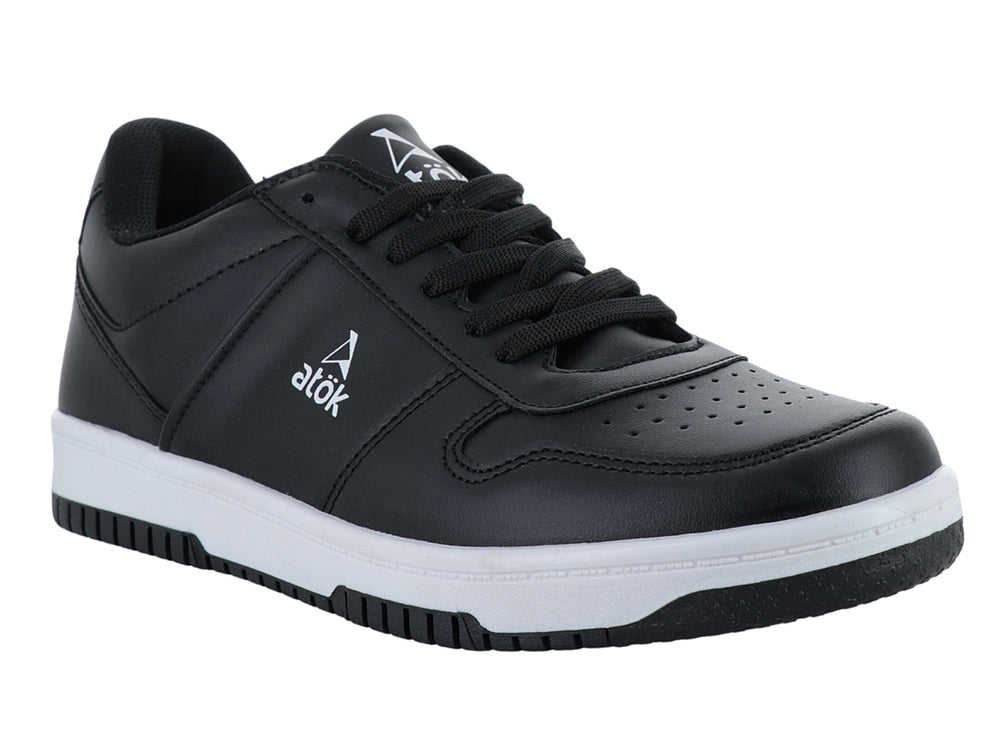 Tenis ATOK color negro con suela blanca y agujetas negras, vista lateral sobre fondo blanco.