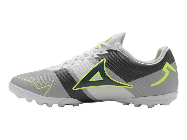 Zapato de fútbol Pirma Brasil en color gris con detalles en verde neón y suela para césped sintético.