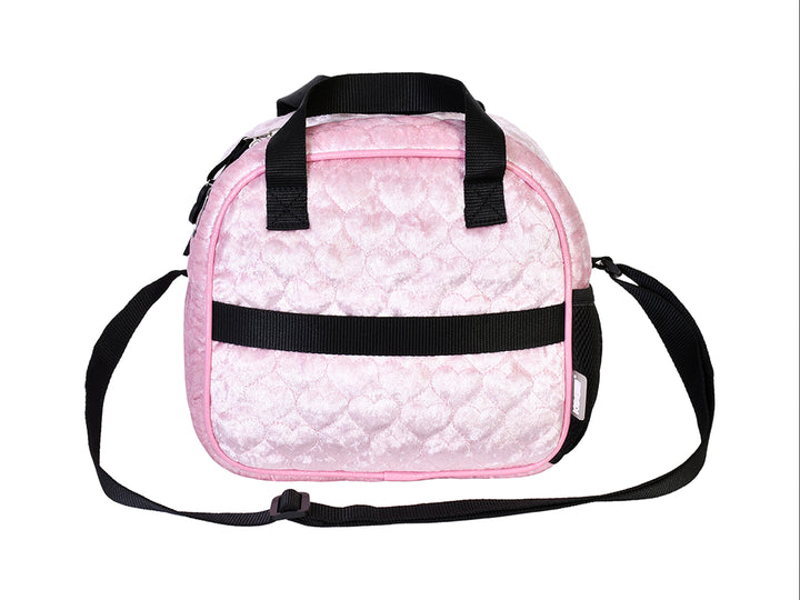 Lonchera infantil de Barbie en color rosa con textura acolchada y detalles en negro.