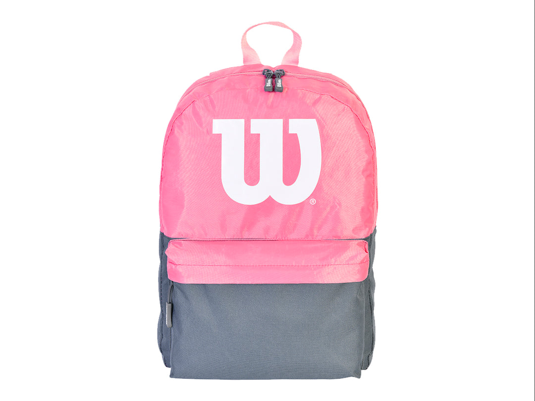 Mochila deportiva Wilson en colores rosa y negro con logotipo blanco frontal.