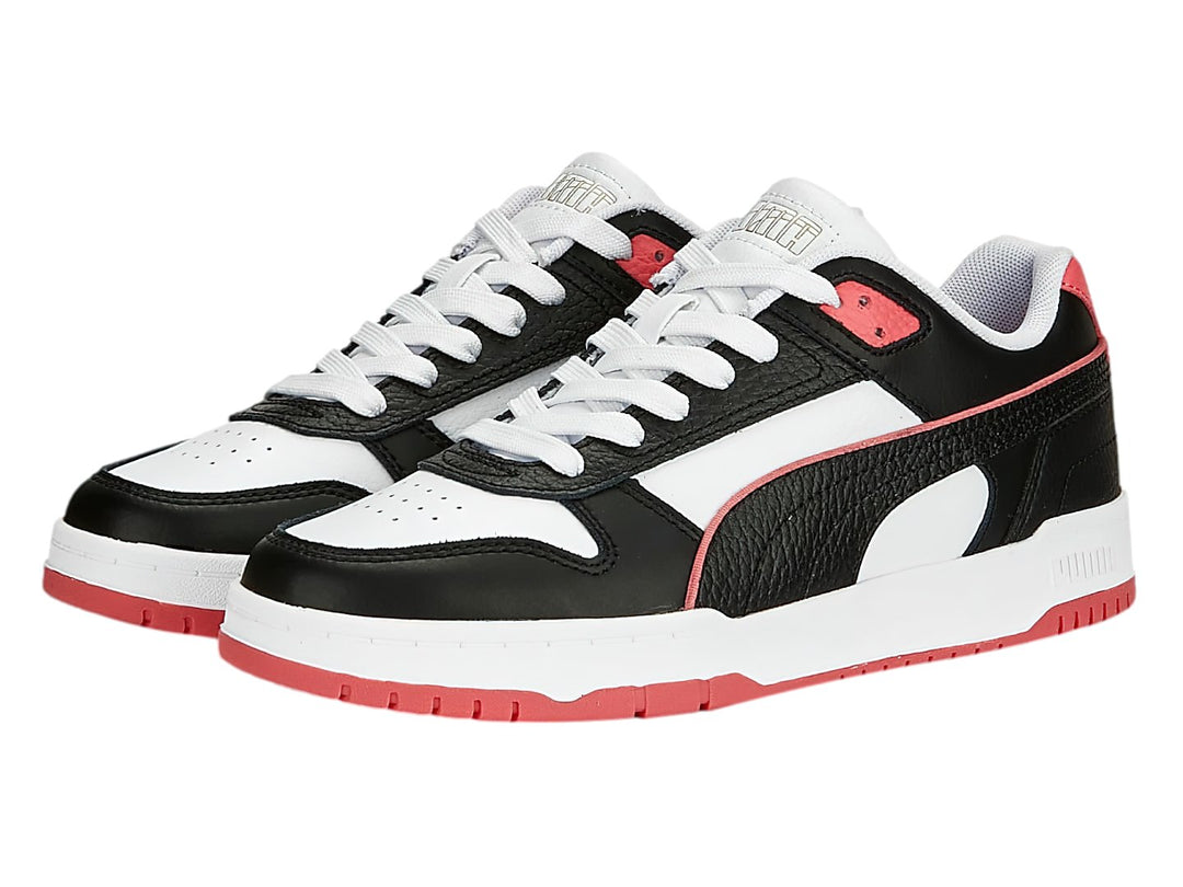 Tenis PUMA RBD Game Low en colores negro, blanco y rosa con diseño deportivo de corte bajo.