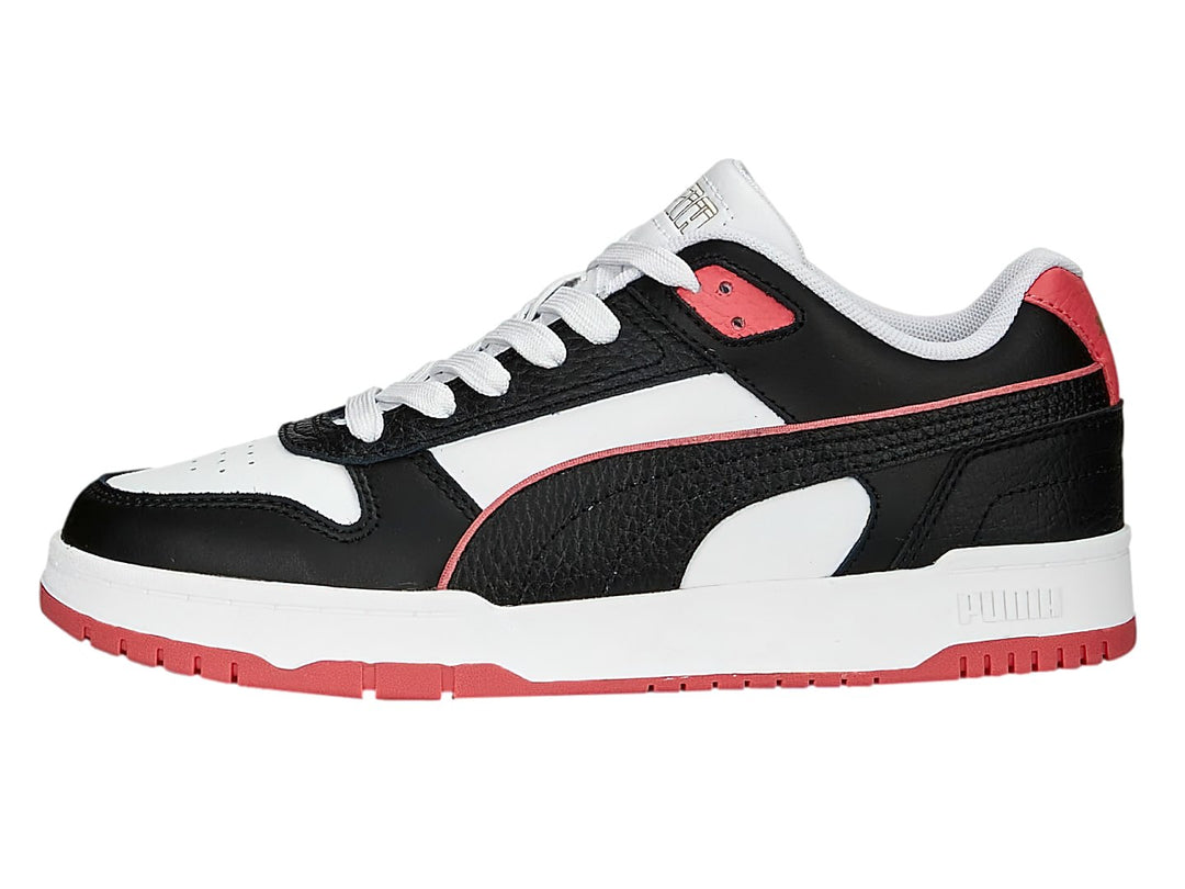 Tenis PUMA RBD Game Low en colores negro, blanco y rosa con diseño deportivo de corte bajo.