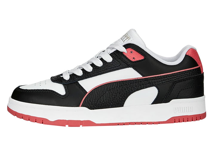Tenis PUMA RBD Game Low en colores negro, blanco y rosa con diseño deportivo de corte bajo.