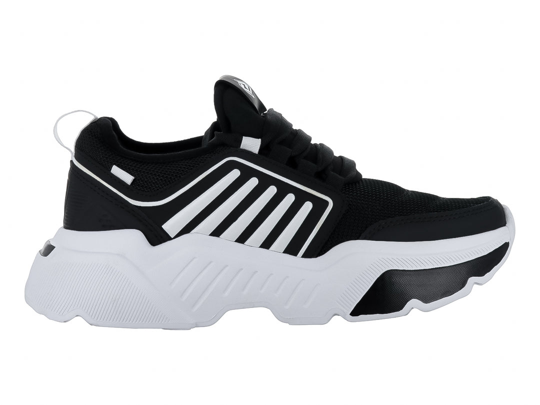 Tenis de baloncesto marca THENTIC en colores negro y blanco con suela blanca robusta y detalles de rayas laterales.