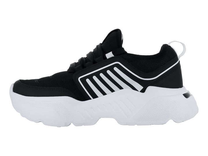 Tenis de baloncesto marca THENTIC en colores negro y blanco con suela blanca robusta y detalles de rayas laterales.
