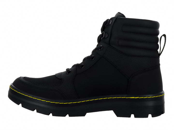 Botas SOLIE color negro con costuras decorativas en amarillo y suela gruesa dentada.