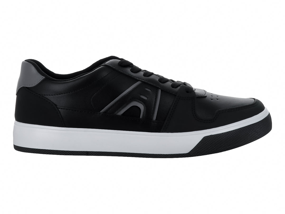 Tenis casuales SOLIE color negro con suela blanca y detalles en gris.