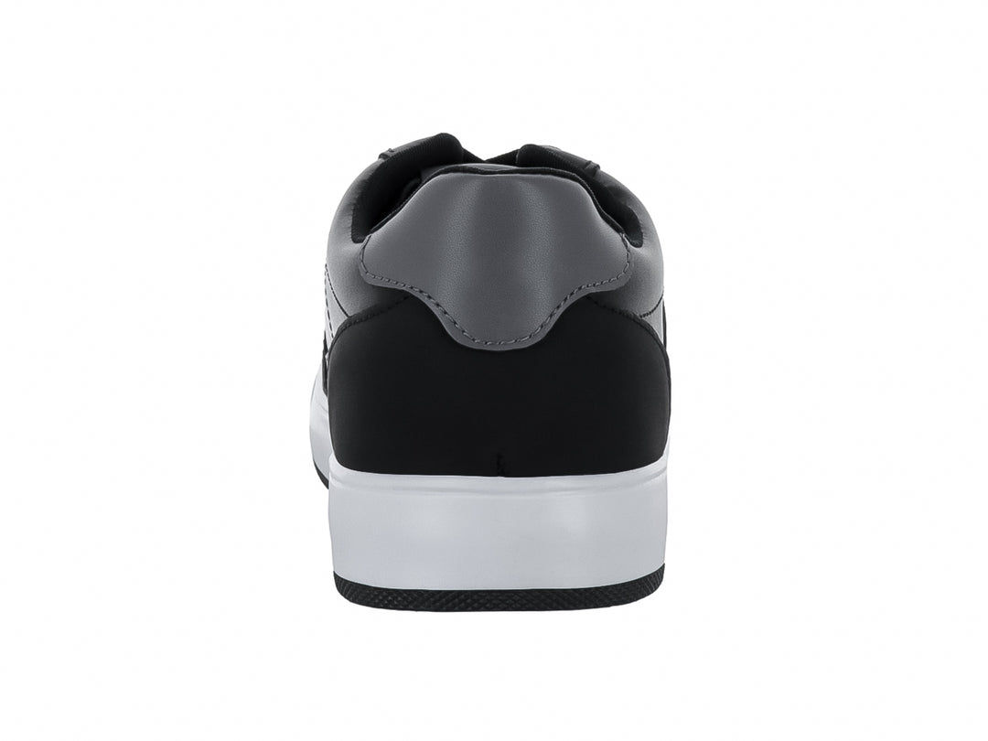 Tenis casuales SOLIE color negro con suela blanca y detalles en gris.