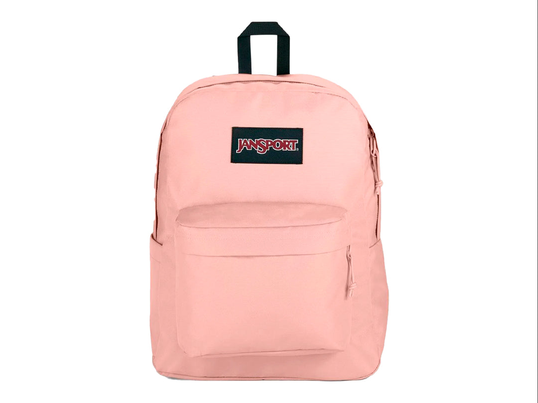 Mochila escolar JanSport color rosa Misty Rose con bolsillo frontal y asa superior negra.