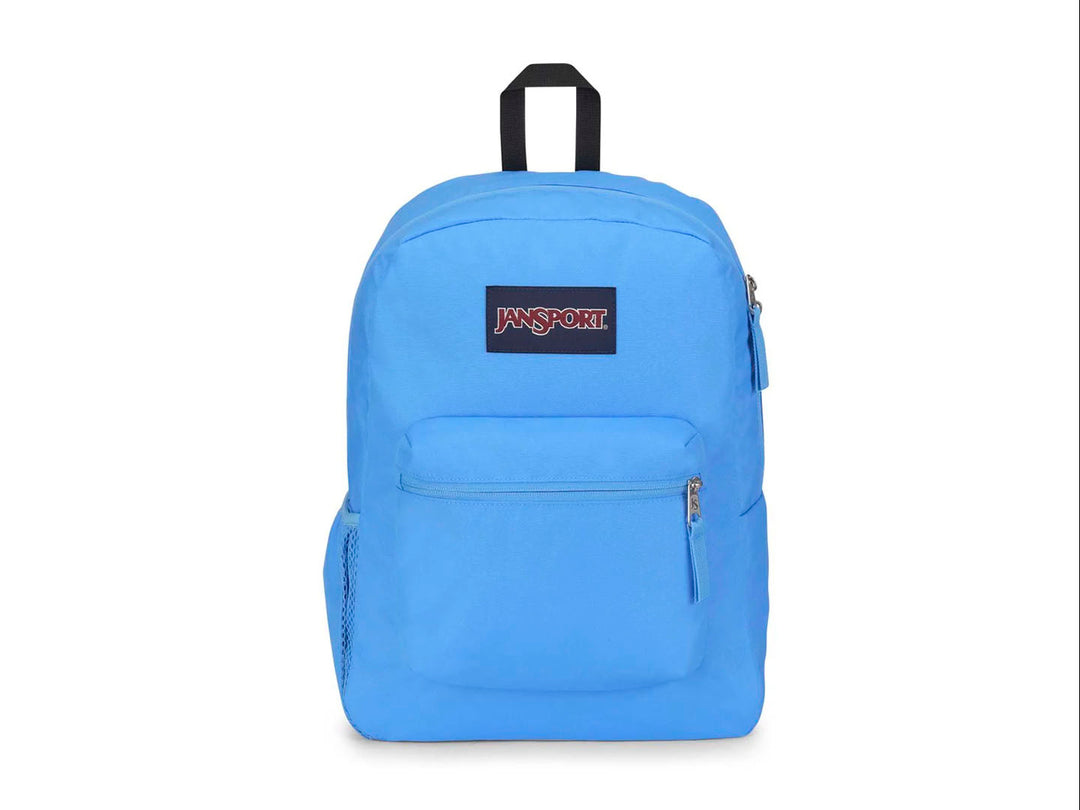 Mochila JanSport modelo Cross Town en color azul neón con un bolsillo frontal y asa superior negra.