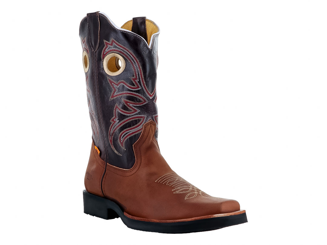 Bota vaquera para hombre marca Angus en color miel y negro con detalles bordados en la caña.