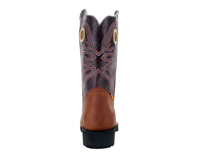 Bota vaquera para hombre marca Angus en color miel y negro con detalles bordados en la caña.