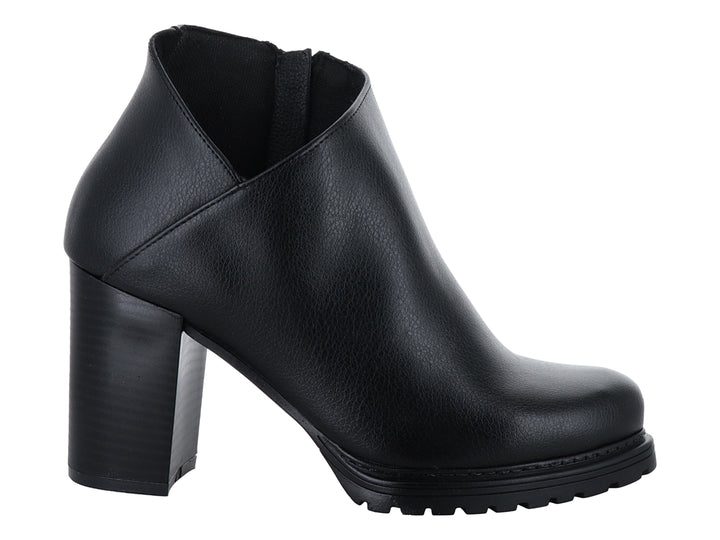 Botín negro de tacón grueso y suela dentada para mujer, estilo casual.