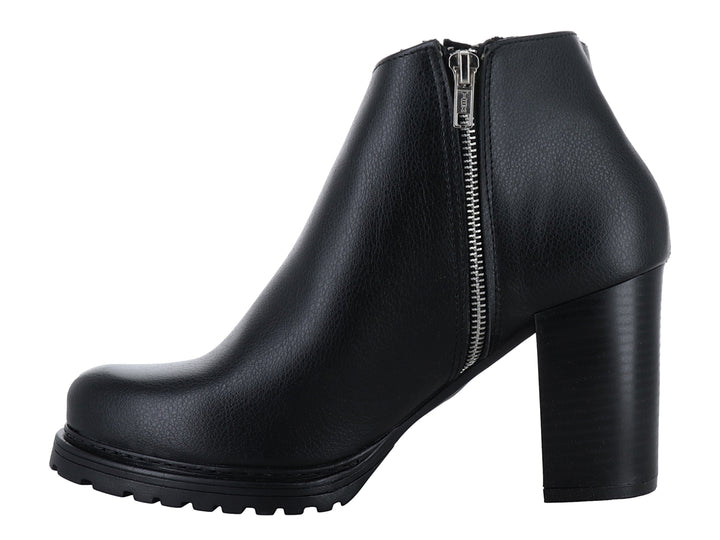 Botín negro de tacón grueso y suela dentada para mujer, estilo casual.
