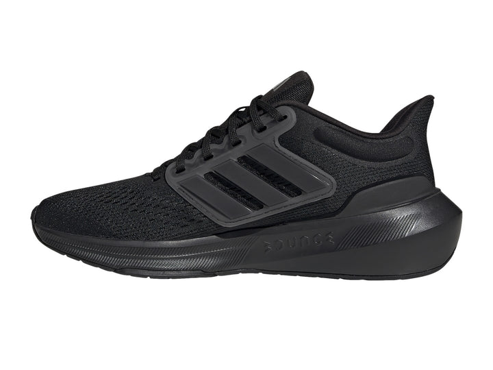 Tenis deportivos Adidas Ultrabounce en color negro total con tejido de malla y suela gruesa.