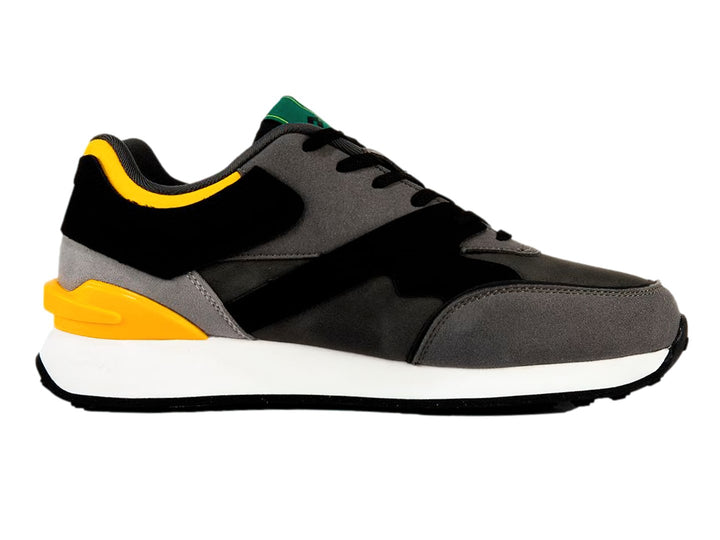 Tenis deportivos Lotto en colores gris, negro y amarillo con suela blanca y detalles verdes.