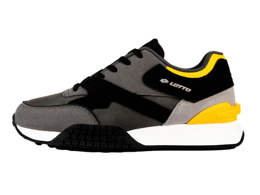 Tenis deportivos Lotto en colores gris, negro y amarillo con suela blanca y detalles verdes.