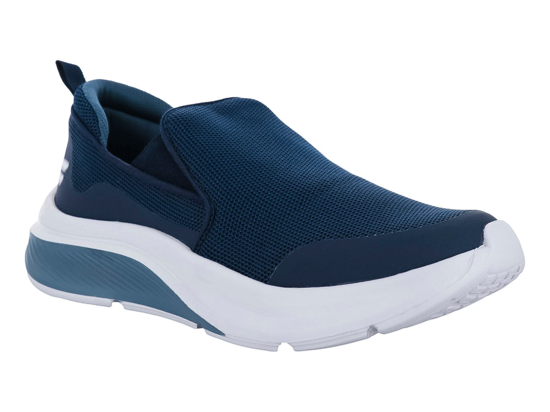 Tenis deportivos slip-on color azul marino con suela blanca y gris.