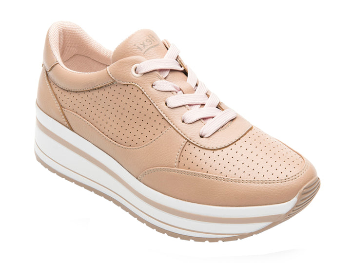 Tenis Flexi para mujer en color rosa con suela de plataforma blanca y detalles perforados.
