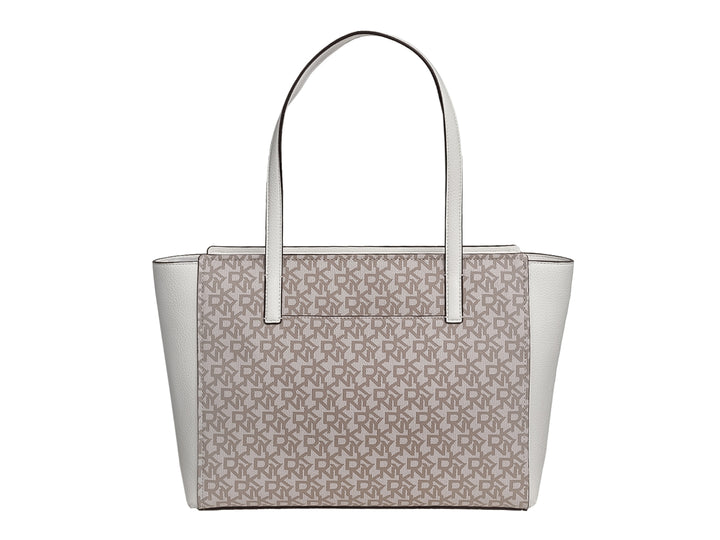 Bolso tote DKNY en color blanco y beige con estampado de monograma y herrajes metálicos.