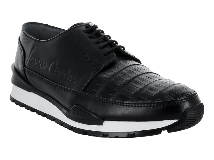 Zapato casual negro de marca Cuadra con detalles en piel de caimán y suela blanca contrastante.