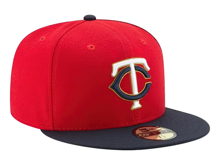Gorra New Era roja con visera azul marino y logotipo bordado de los Minnesota Twins en el frente.