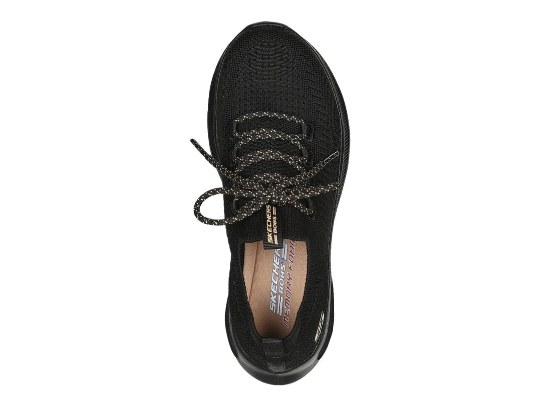 Tenis deportivos Skechers BOBS Sport en color negro con detalles dorados y tejido transpirable.