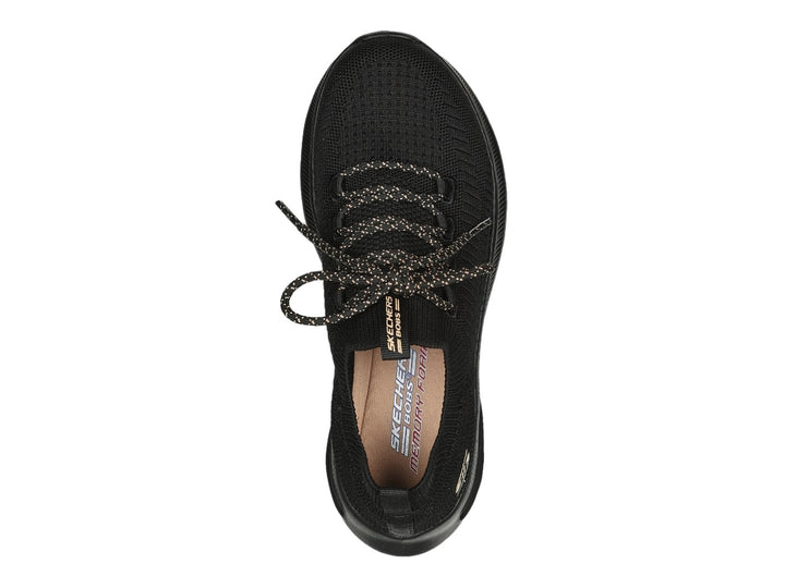 Tenis deportivos Skechers BOBS Sport en color negro con detalles dorados y tejido transpirable.