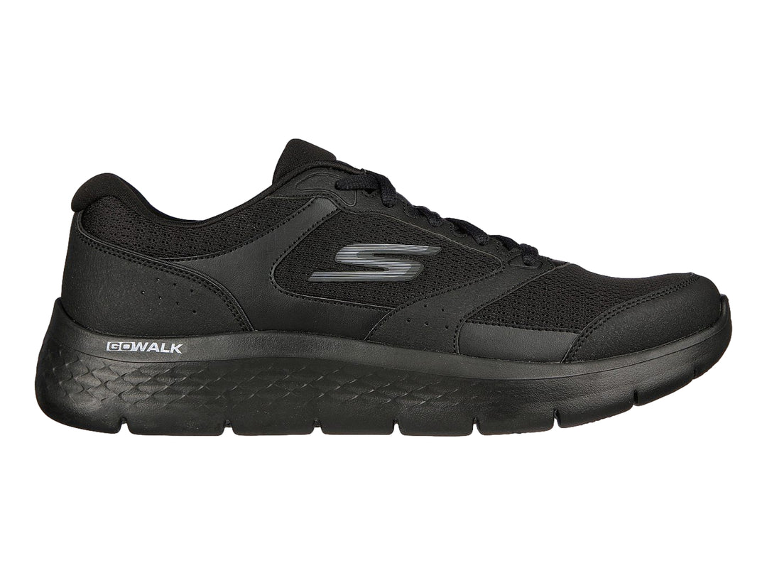Tenis deportivos Skechers Go Walk Flex en color negro con suela flexible y detalles en malla.