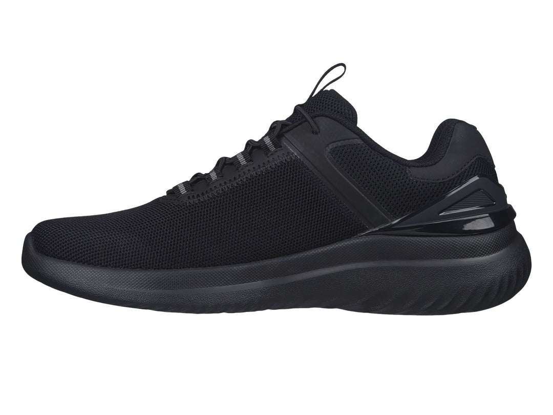 Zapato deportivo Skechers color negro con tejido de malla y suela ligera.