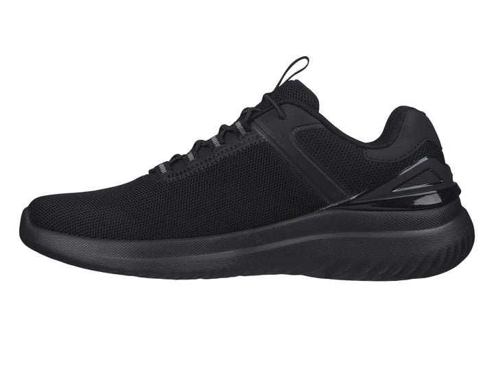 Zapato deportivo Skechers color negro con tejido de malla y suela ligera.