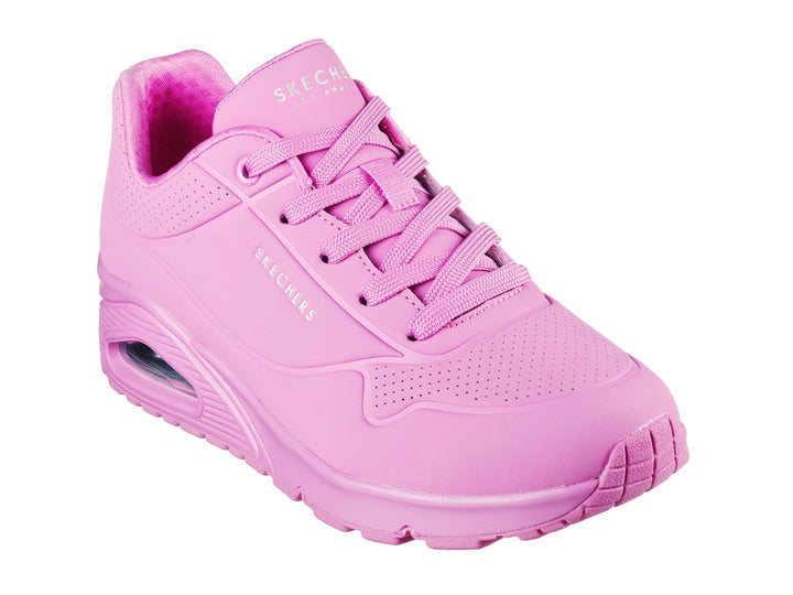 Tenis deportivos Skechers color rosa con cámara de aire en el talón y agujetas.