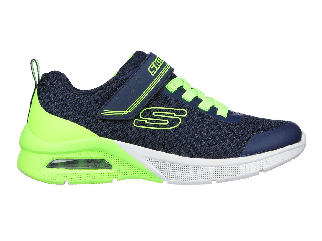 Tenis deportivos Skechers para niño en color azul marino y verde lima con cierre de velcro.