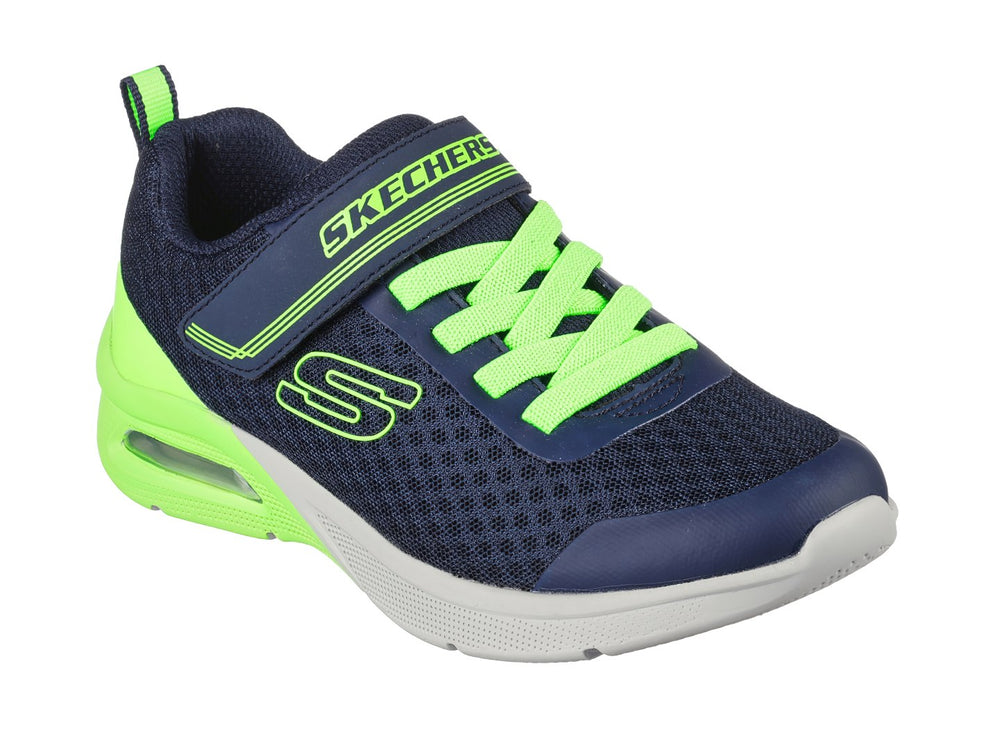 Tenis deportivos Skechers para niño en color azul marino y verde lima con cierre de velcro.
