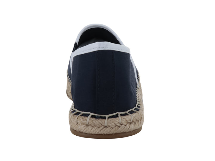 Zapato alpargata azul marino con suela de yute y detalles en blanco.