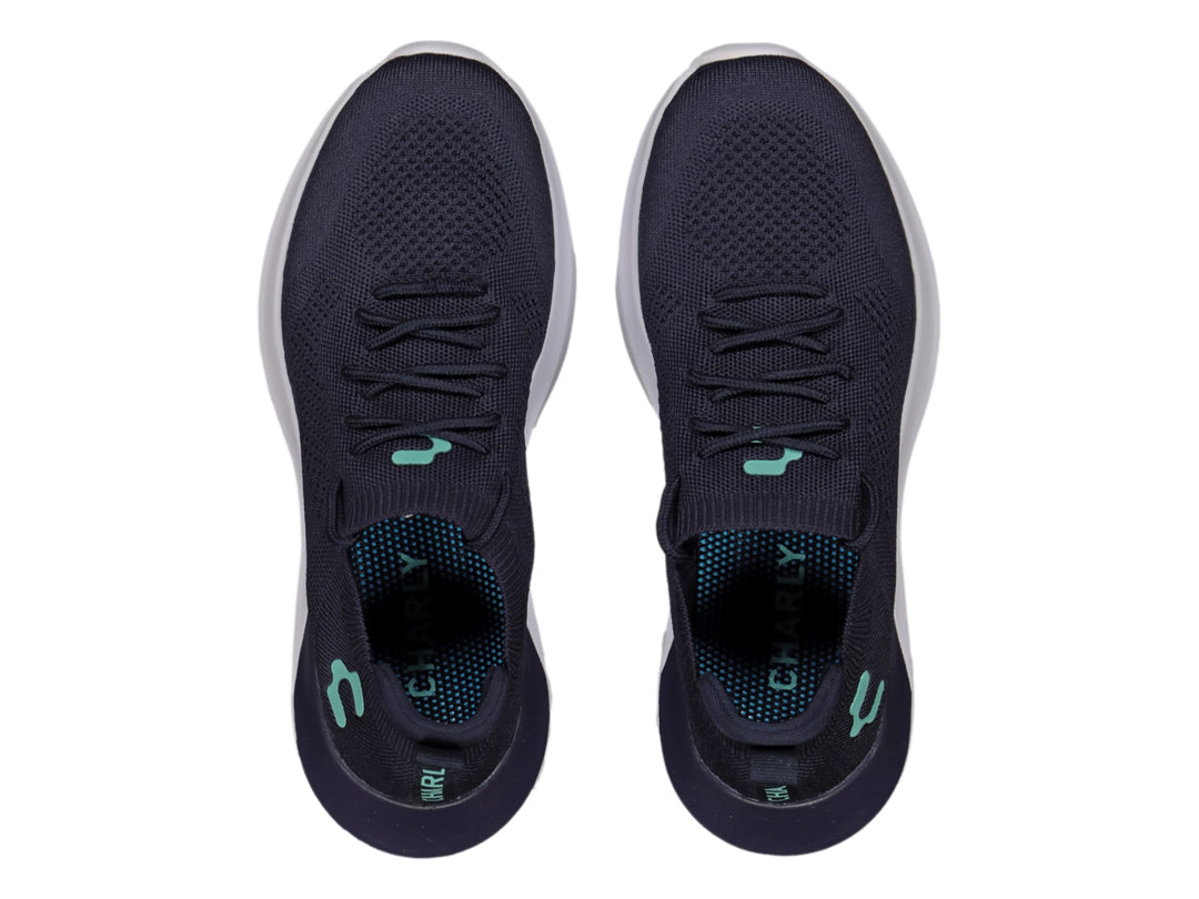 Tenis deportivos Charly en color azul marino con suela blanca y detalles en aqua.