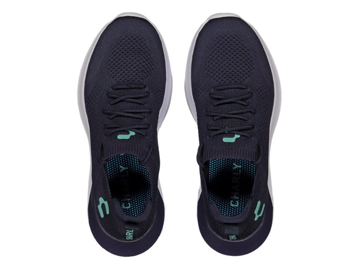 Tenis deportivos Charly en color azul marino con suela blanca y detalles en aqua.