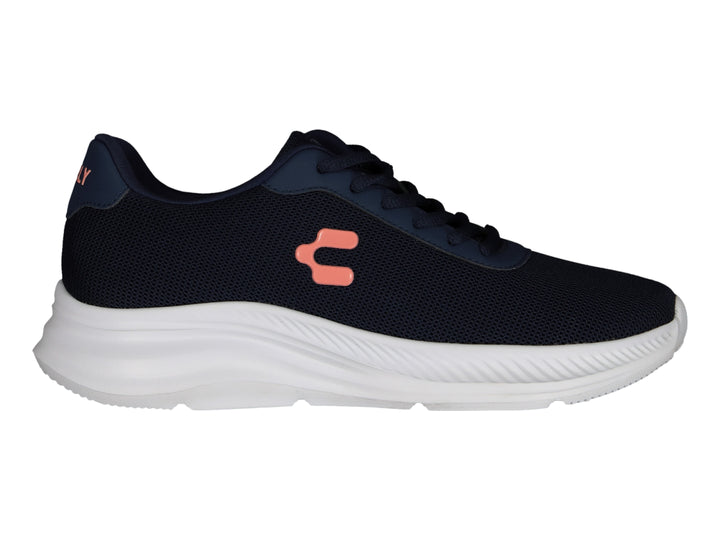 Tenis deportivos Charly en color azul marino con suela blanca y logo naranja lateral.