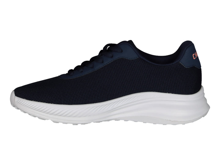 Tenis deportivos Charly en color azul marino con suela blanca y logo naranja lateral.