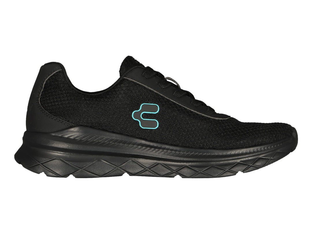 Tenis deportivos Charly color negro con suela gruesa y logo lateral en azul claro.