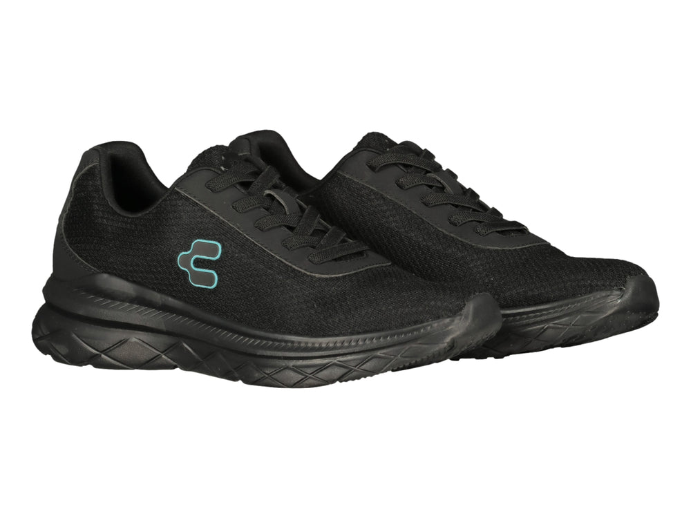 Tenis deportivos Charly color negro con suela gruesa y logo lateral en azul claro.