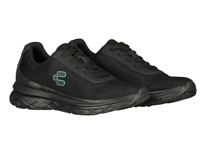 Tenis deportivos Charly color negro con suela gruesa y logo lateral en azul claro.