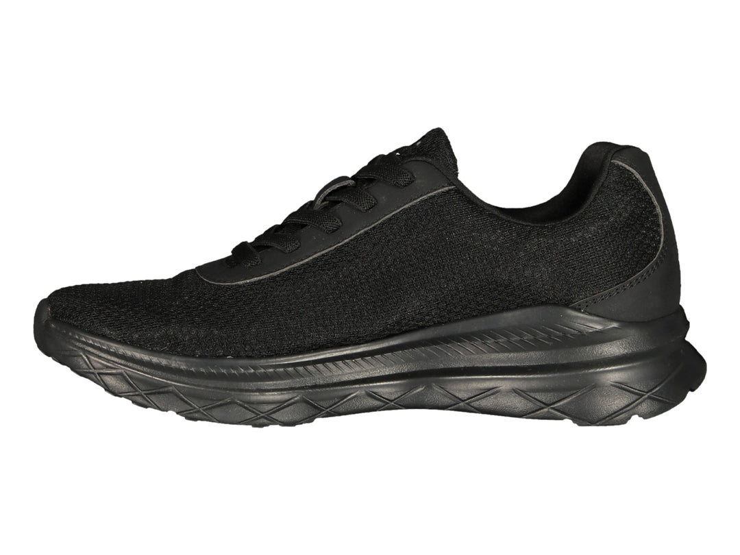 Tenis deportivos Charly color negro con suela gruesa y logo lateral en azul claro.