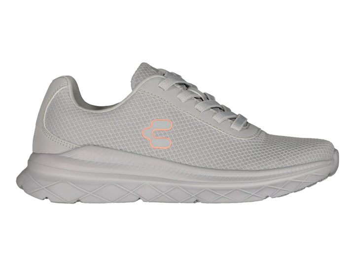 Tenis deportivos Charly de color gris con suela gruesa y tejido de malla.