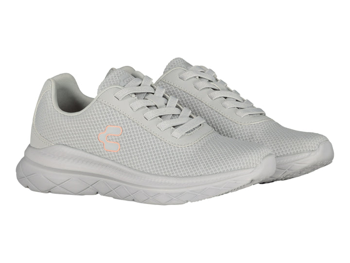 Tenis deportivos Charly de color gris con suela gruesa y tejido de malla.
